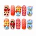 Set of colorful nail art designs on a white background