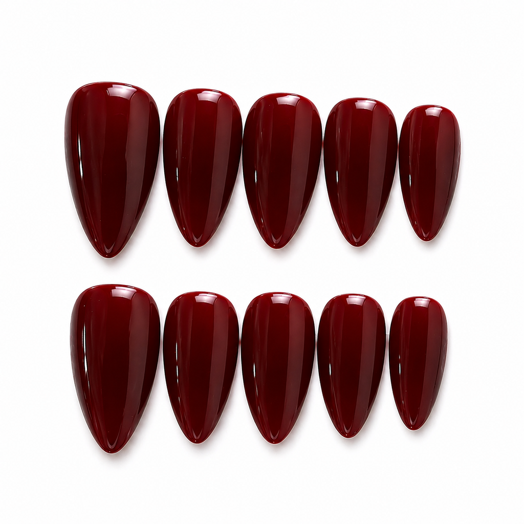 Set of red nail polish on a white background