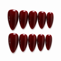 Set of red nail polish on a white background