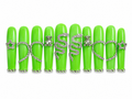 Handmade long coffin press-on nails in glossy neon green featuring silver rhinestone snake charms, heart outlines, teddy bear accents, and star details for a bold luxury statement nail design on a white background.