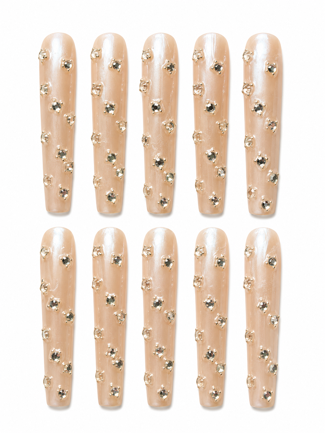 nude pearl press on nails on a white background