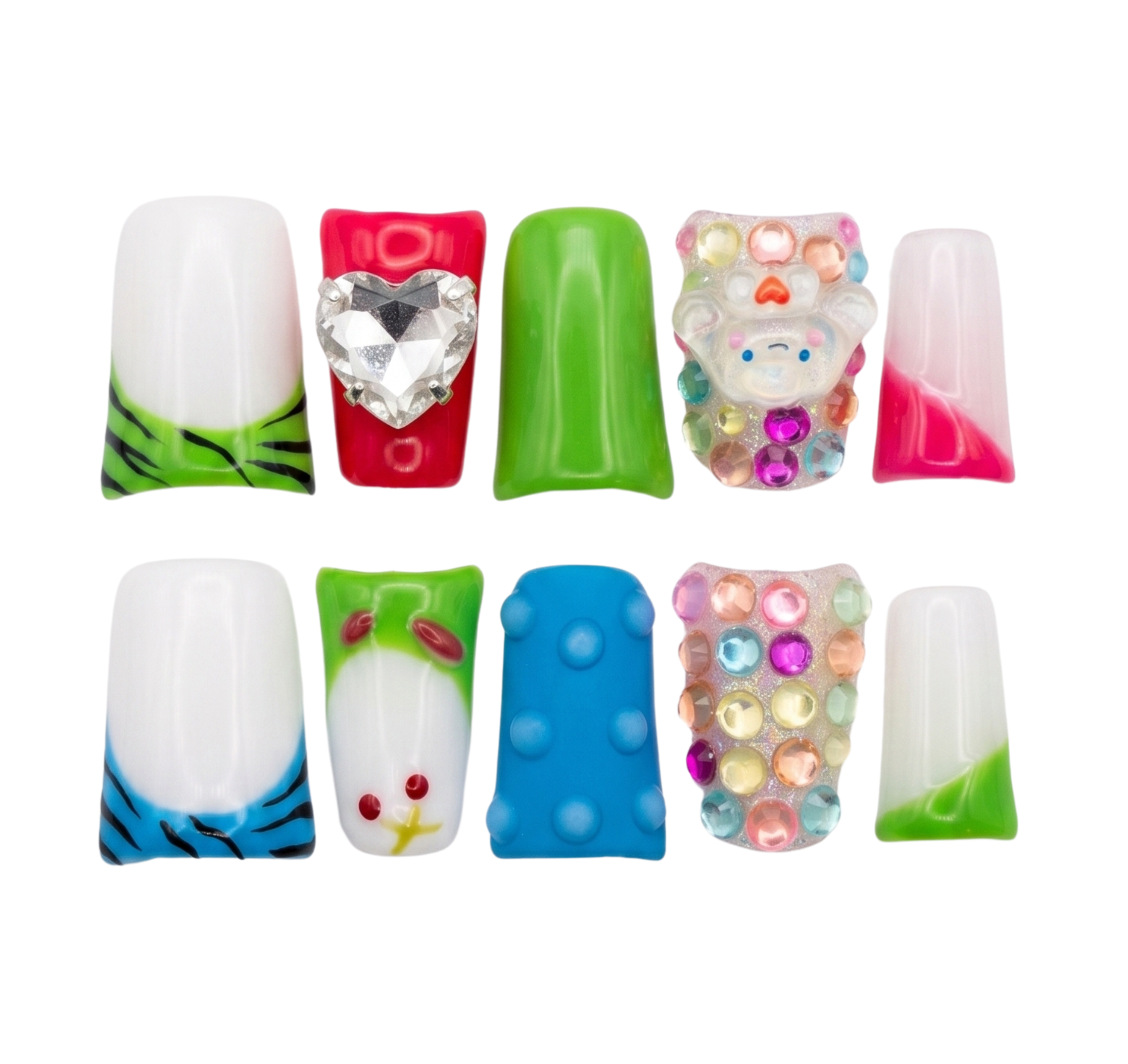 Y2K-inspired press on nail set with green tiger stripes, bold red with a massive crystal heart gem, solid green, a teddy bear charm surrounded by colorful rhinestones, hot pink with a marbled swirl, a bunny character nail, blue bubble dots, and a pastel glitter base. No two nails are the same.