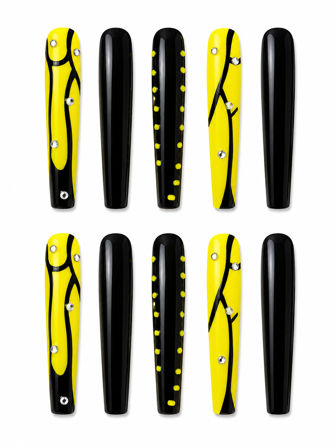 Handmade long coffin press-on nails in glossy black and neon yellow featuring abstract swirl designs, rhinestone accents, dotted detailing, and solid black statement nails displayed on a white background.